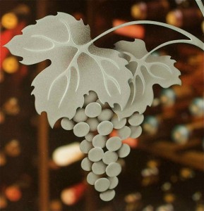 etched glass decorative wine cellar door glass grape cluster close This grape cluster and leaves are a "multi-stage" sandblast. Each grape has been sandblasted one at a time.