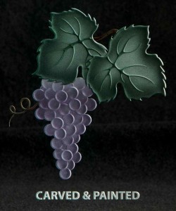 This grape cluster has been carved and painted. Adding color to the design creates a very dramatic finish.