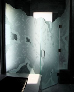 etched decorative glass shower enclosure abstract chiseled edges arctic "Arctic" shower enclosure, features heavy glass overlay pieces, chiseled edges and a stunning random texture. The shower is being illuminated by the window on the opposite wall. Commissioned by Susan Schreiber Interior Designs.