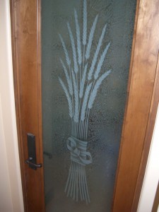 etched pantry door glass bundled wheat ribbon bow "Bundled Wheat" pantry door etched glass. The wheat and bow are multi-stage sculpture carved, the background is gluechipped for obscurity.