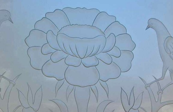 carved glass window solid rose Carved Glass Window: My final example, this window is made up of a heavy glass pane, suitable for carvng. The flowers have been beautifully SOLID CARVED. There is no shading, but the glass is not merely "etched", but three-dimensionally sculpture carved. The details in this glass, are absolutely stunning. Click on the photo for additional images of this (as well as all the windows featured in this blog!)