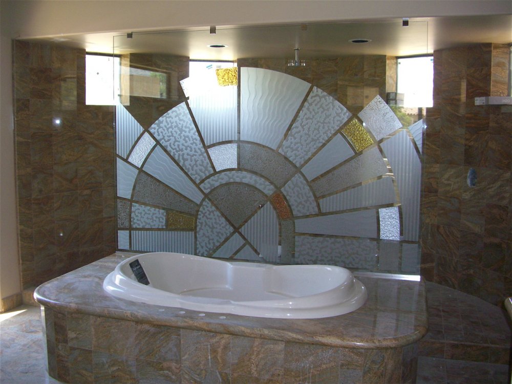 Custom Glass Tub & Shower Partition.  Glass is etched and carved, with painted glass overlay pieces.