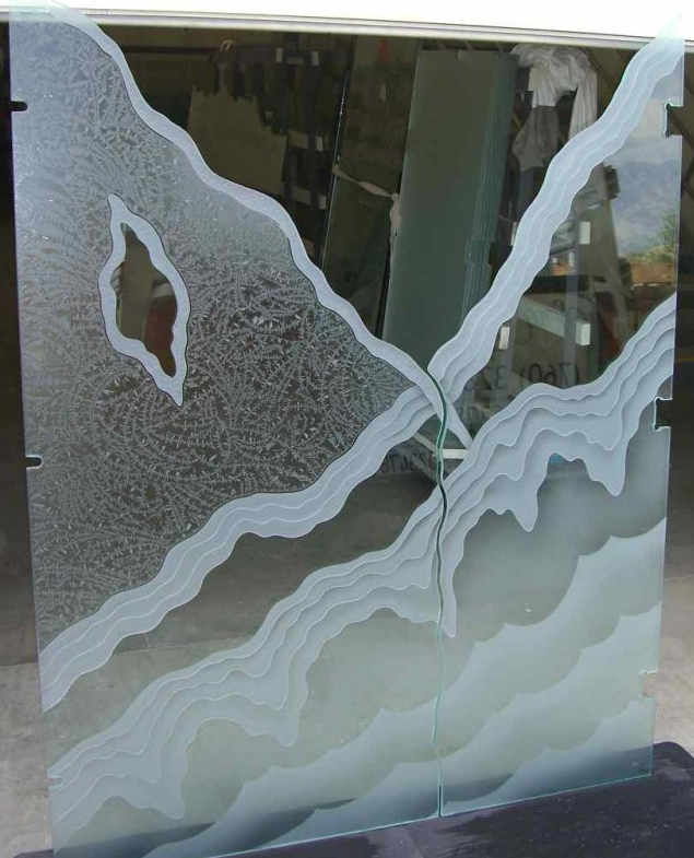 decorative glass panel etched carved rugged retreat sans soucie These are free standing shower partitions, that were crated and shipped out of state, so this photograph is taken at our Studio. The panels are chiseled irregular at the adjoining edges.