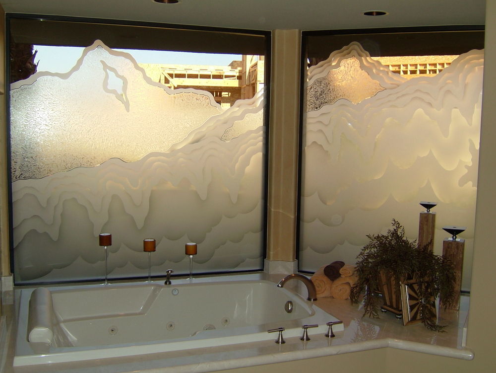 Decorative glass window, etched for privacy for tub & shower area.