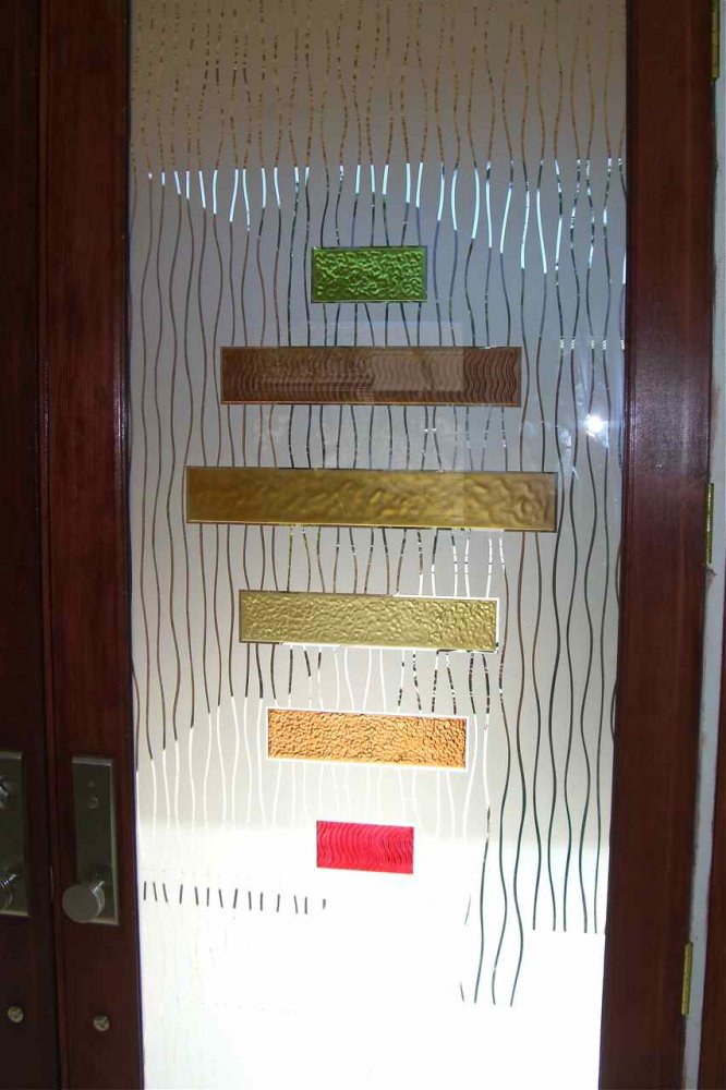 carved glass door contemporary geometric frosted Close up view, showing textures.