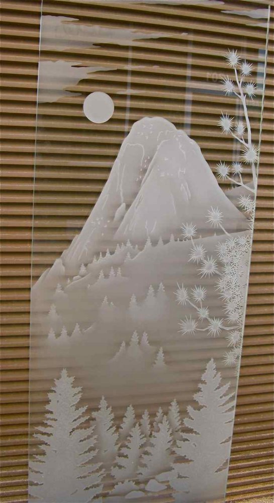 frosted carved glass door idyllwild tahquitz peak pine trees A view of Idyllwild, California's beautiful "Tahquitz Creek" etched and dimensionally sculpture carved in a front entry door glass panel for Idyllwild residence.