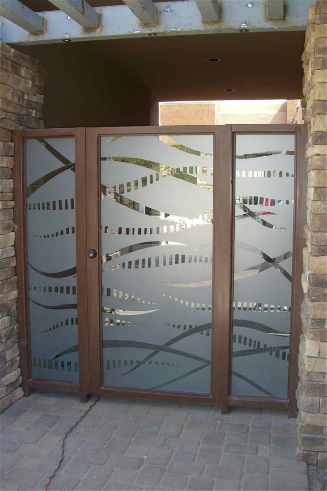 "Trails" gate glass.  A center door panel and two "sidelite" panels.