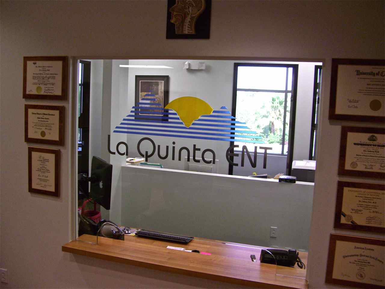 glass sign carved painted la quinta ent - 1