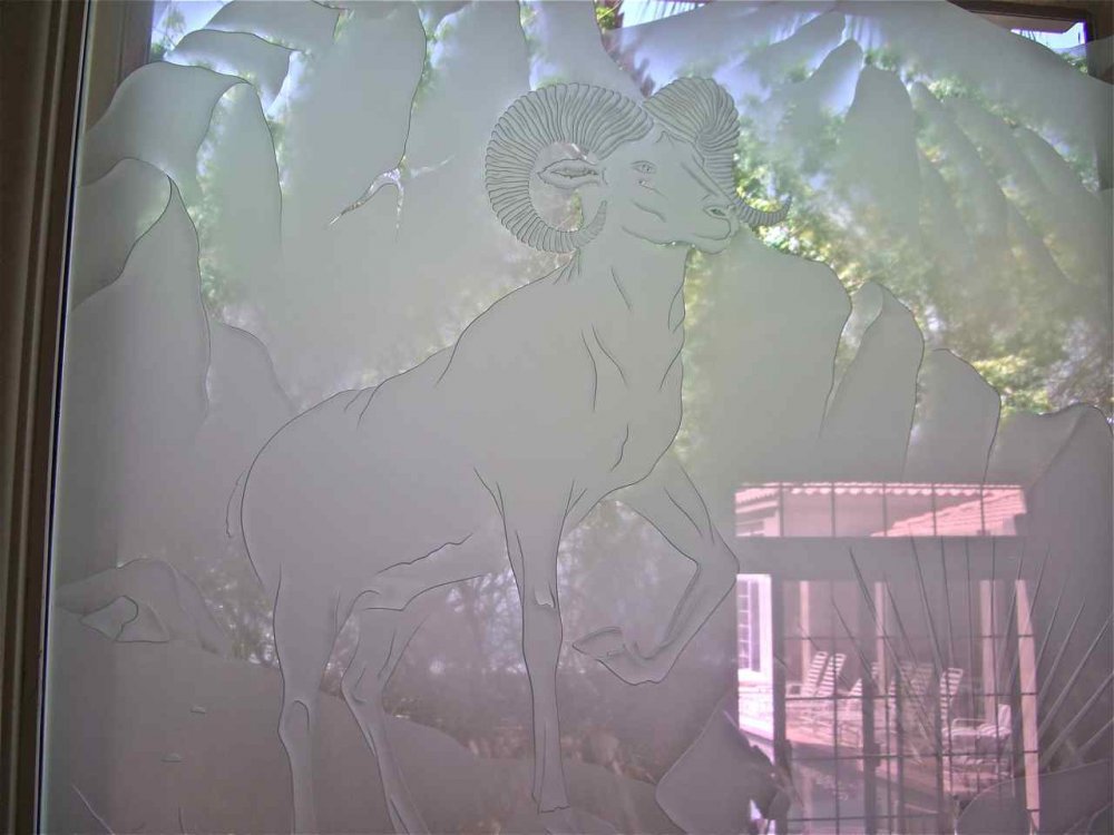 Etched glass wildlife scene