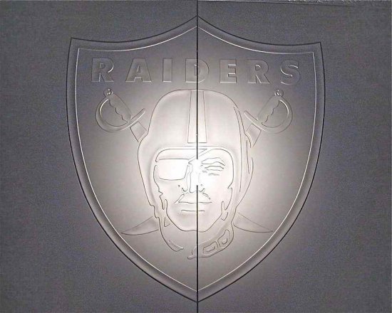 raiders logo in glass