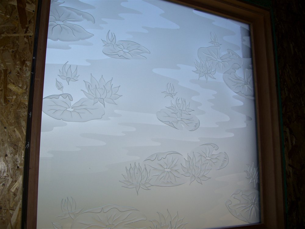 glass window frosted lotus lilly pads